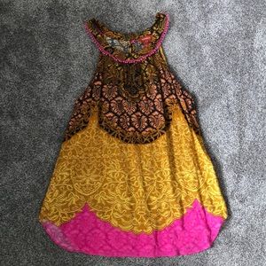 Women’s high neck, sleeveless Sundance blouse.